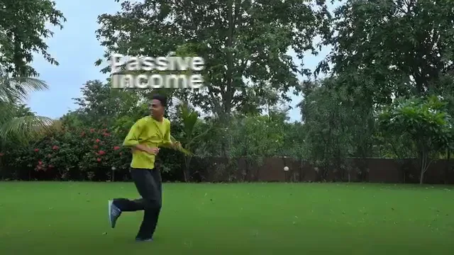 Opening frame of the Wint Wealth ad. A man sprints across a lawn away from camera, chasing the words "passive income" floating ahead of him.